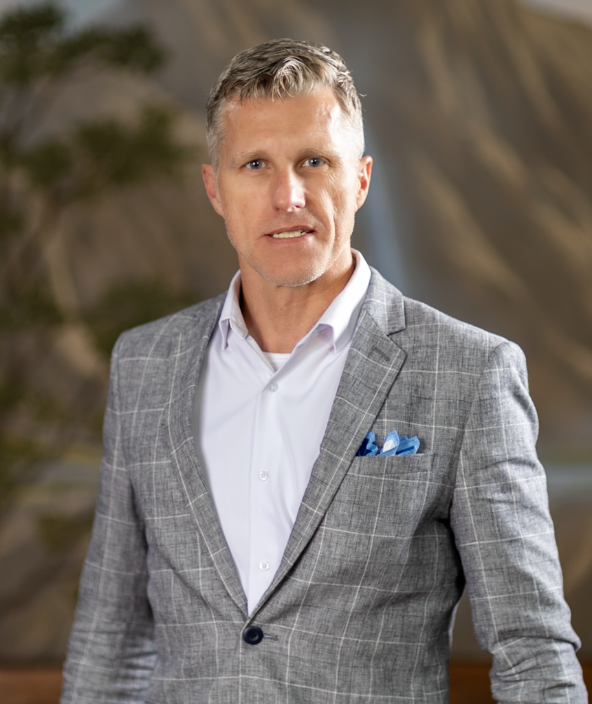 Jim Slaton, founder of Want Web Design, in a professional portrait ready to talk about your website